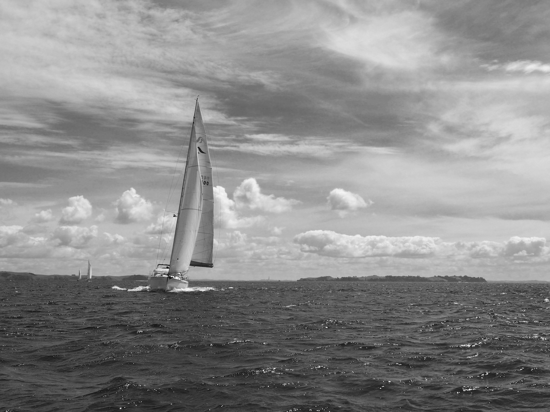 Image of a sailing boat in the Hauraki golf