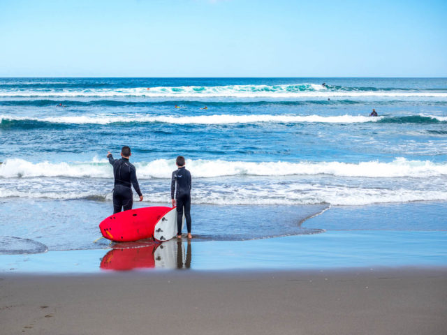 Piha Beach Surfer - West Auckland, New Zealand
