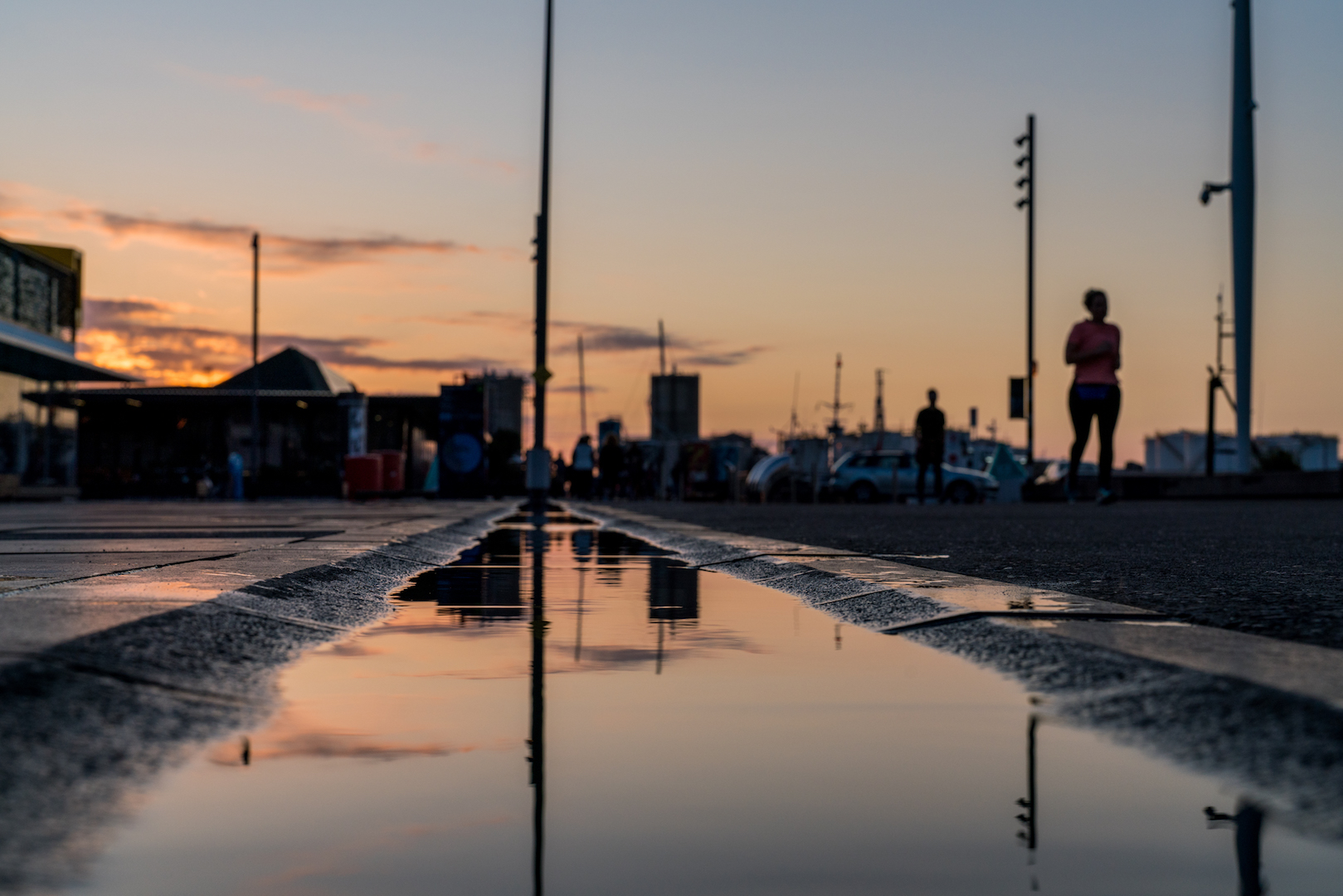 Wynyard Quarter Sunset Reflection in Water Puddle - Street Photography Auckland